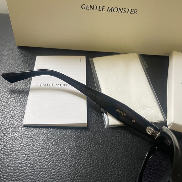 Gentle Monster Black Oval Sunglasses Gold Logo Chic It-Girl Style